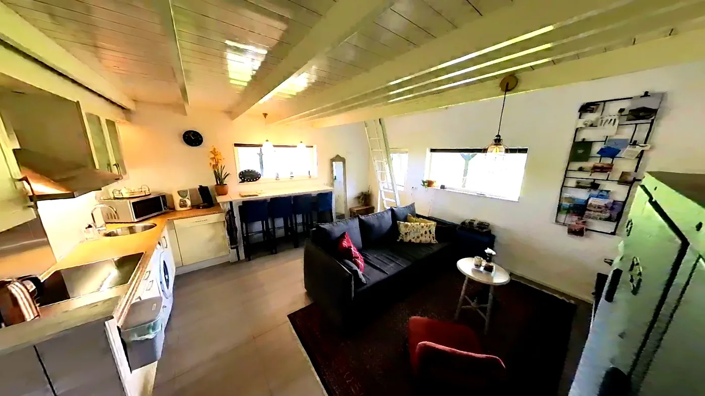Cosy living room with køkken in the feriehus.